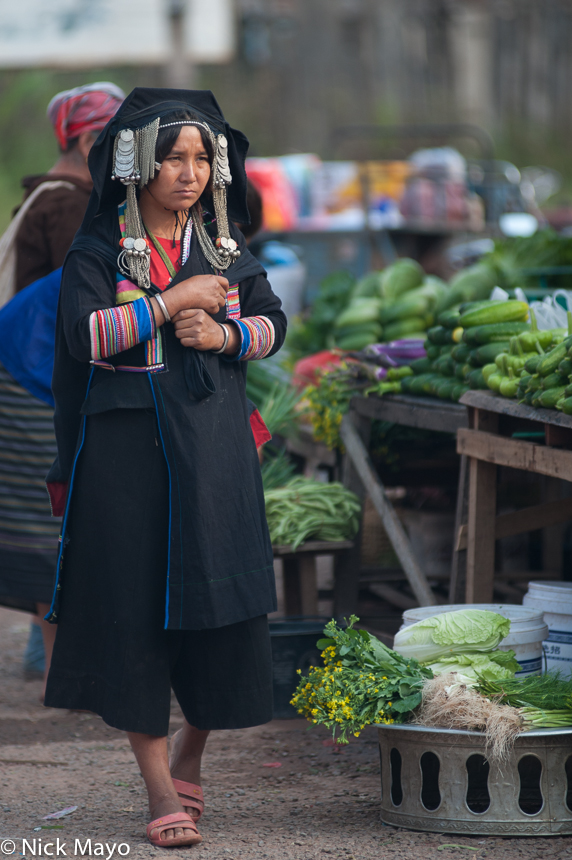 An Akha Pixor (Hani) woman in Boun Yo market.