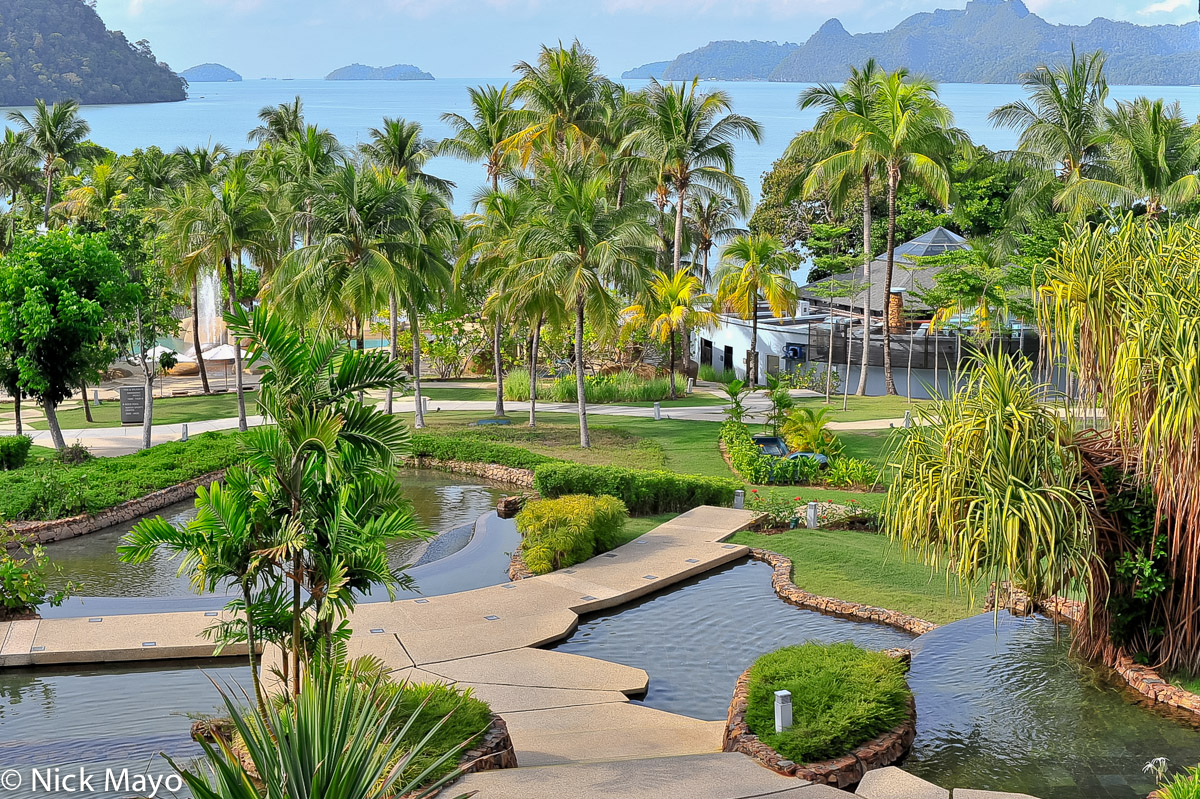 A view from the Westin Hotel at Kuah overlooking the swimming pool and distant jungle clad islands.