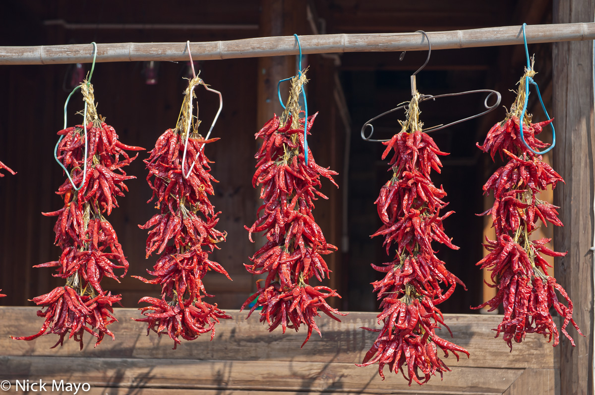 Chillies hung out to dry in the Dong village of Zhenzhong.