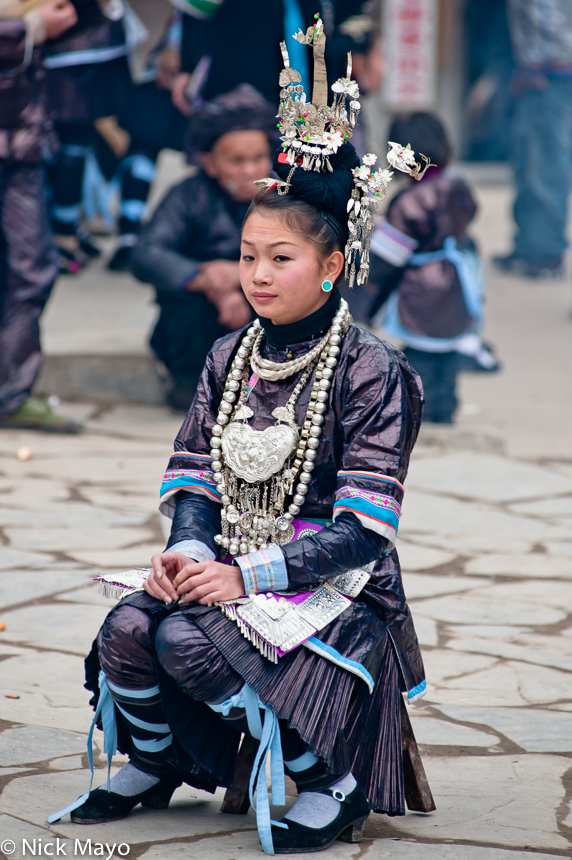 A Dong girl waiting to sing at a festival in Xiaohuang.
