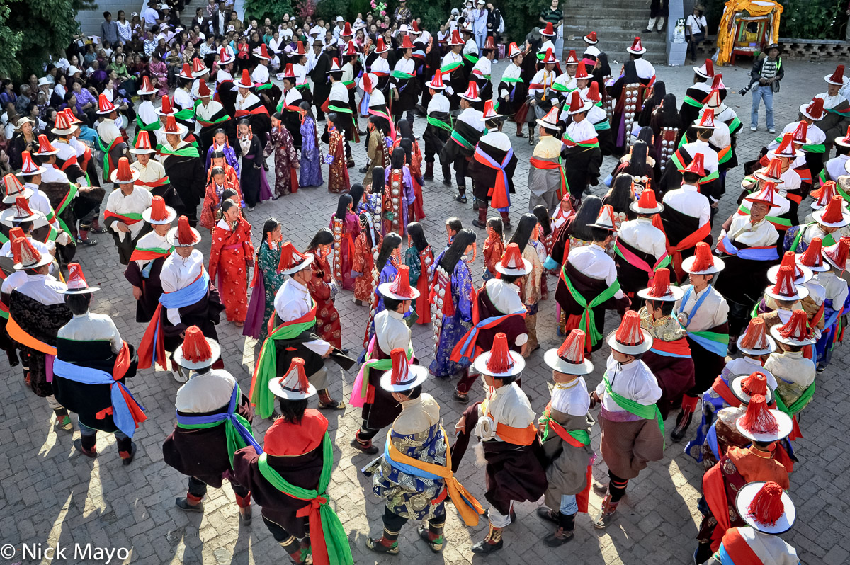 A procession at a Tibetan monastery festival in Rongpo Gyakhar.