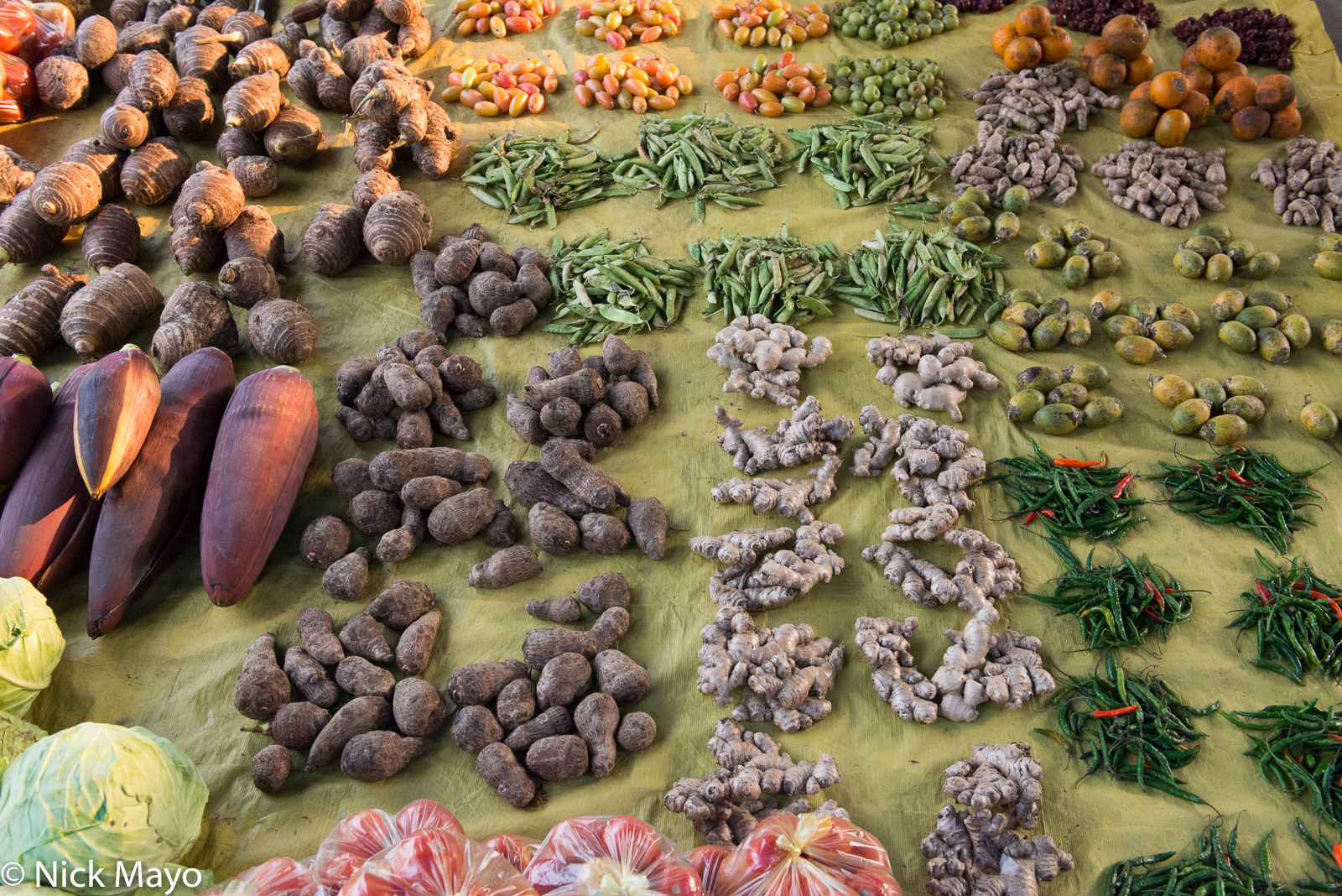 Vegetables on sale in the market at Roing.