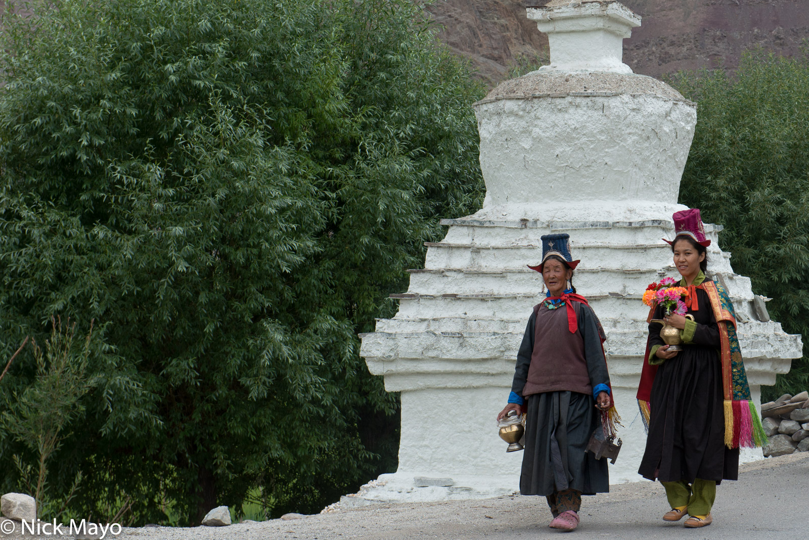 Two Ladakhi women from the village of Miru heading a procession at the conclusion of a religious ritual to bless the crops.