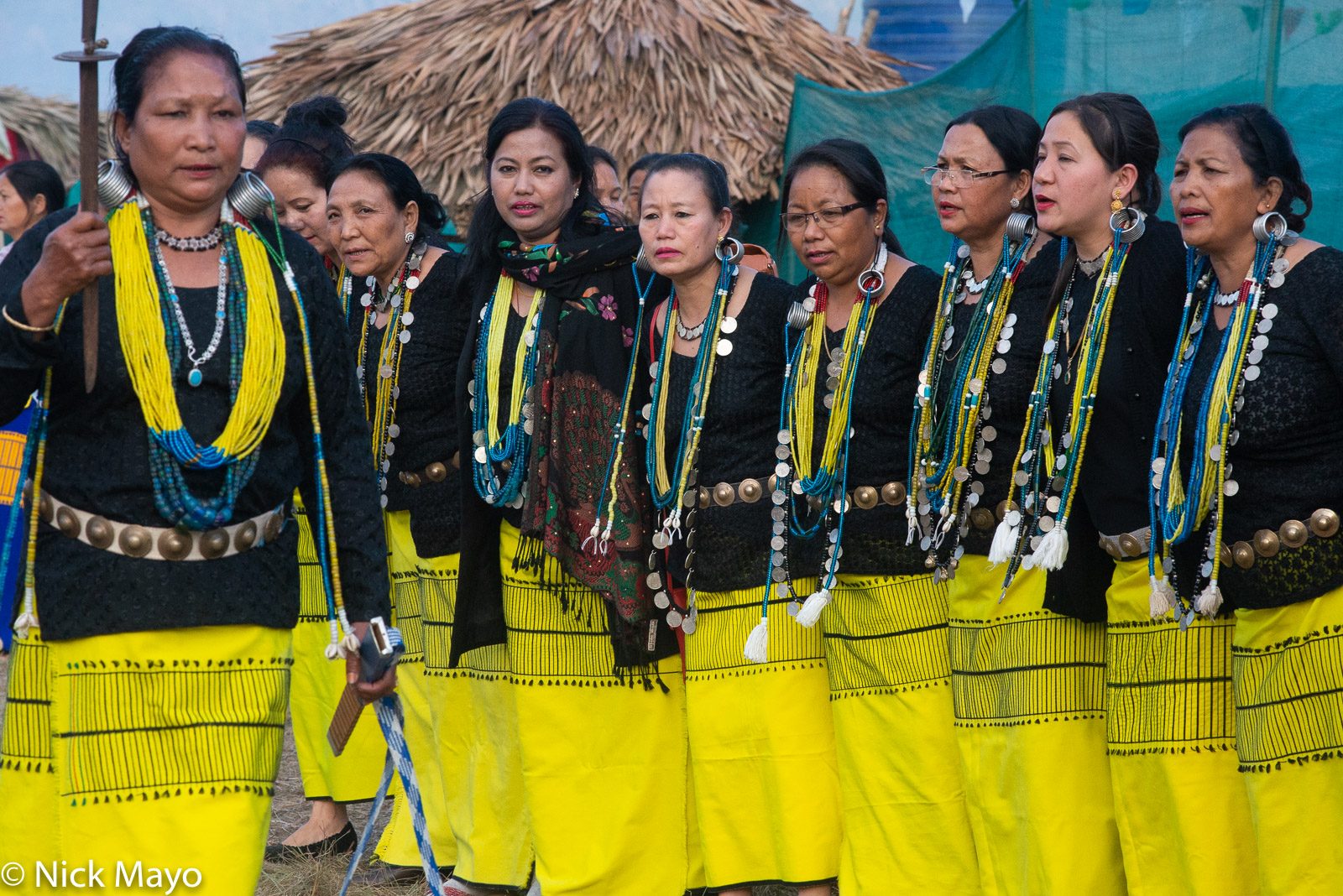 Galo women with coiled earrings at the Yomgo festival held at Aalo in the Siang valley.