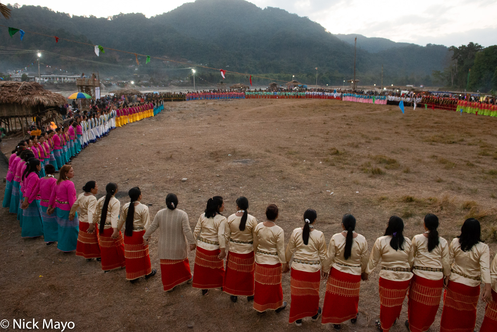 The large circle of dancers on opening night of the Galo festival of Yomgo held at Aalo in the Siang valley.