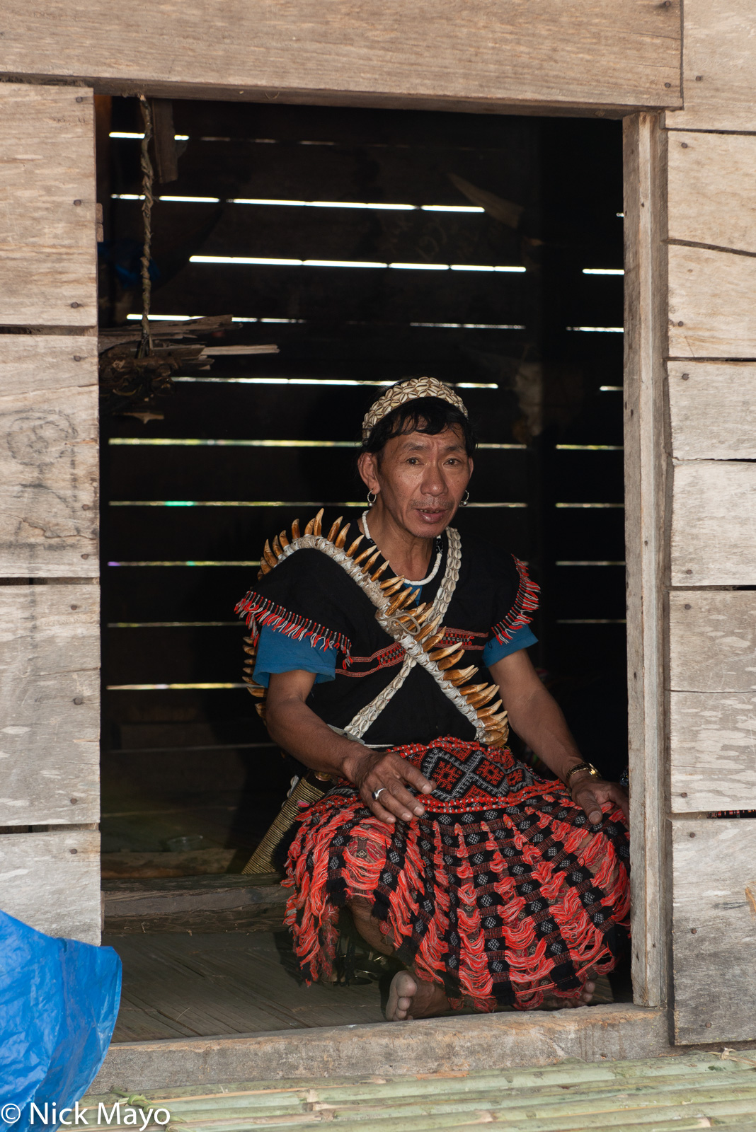 A shaman in traditional dress at the Reh festival in the Idu Mishmi village of Aohali.