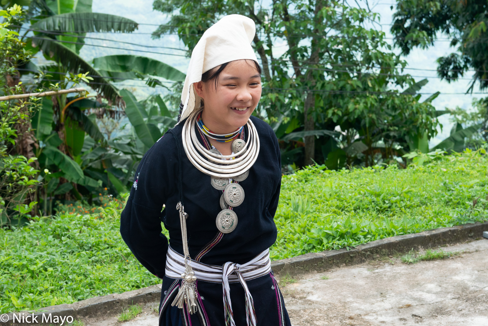 A traditionally dressed Dao Tien girl in Hong Thai.