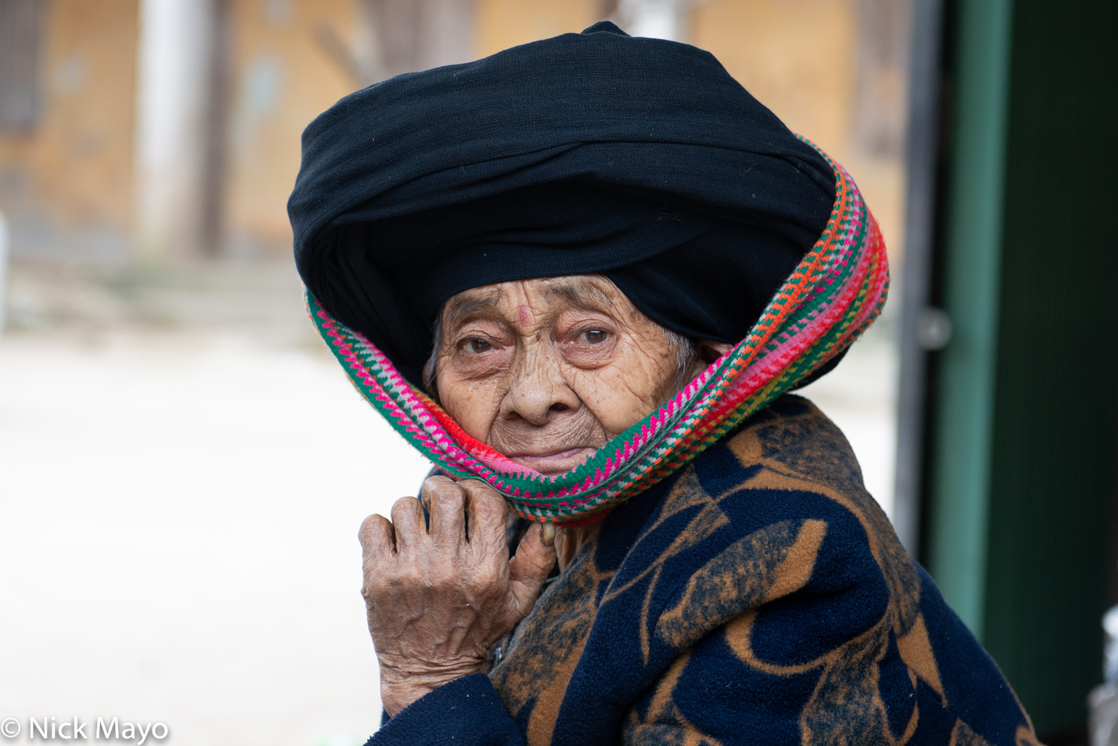 A Dao woman in her traditional turban in the village of Cung Phin.