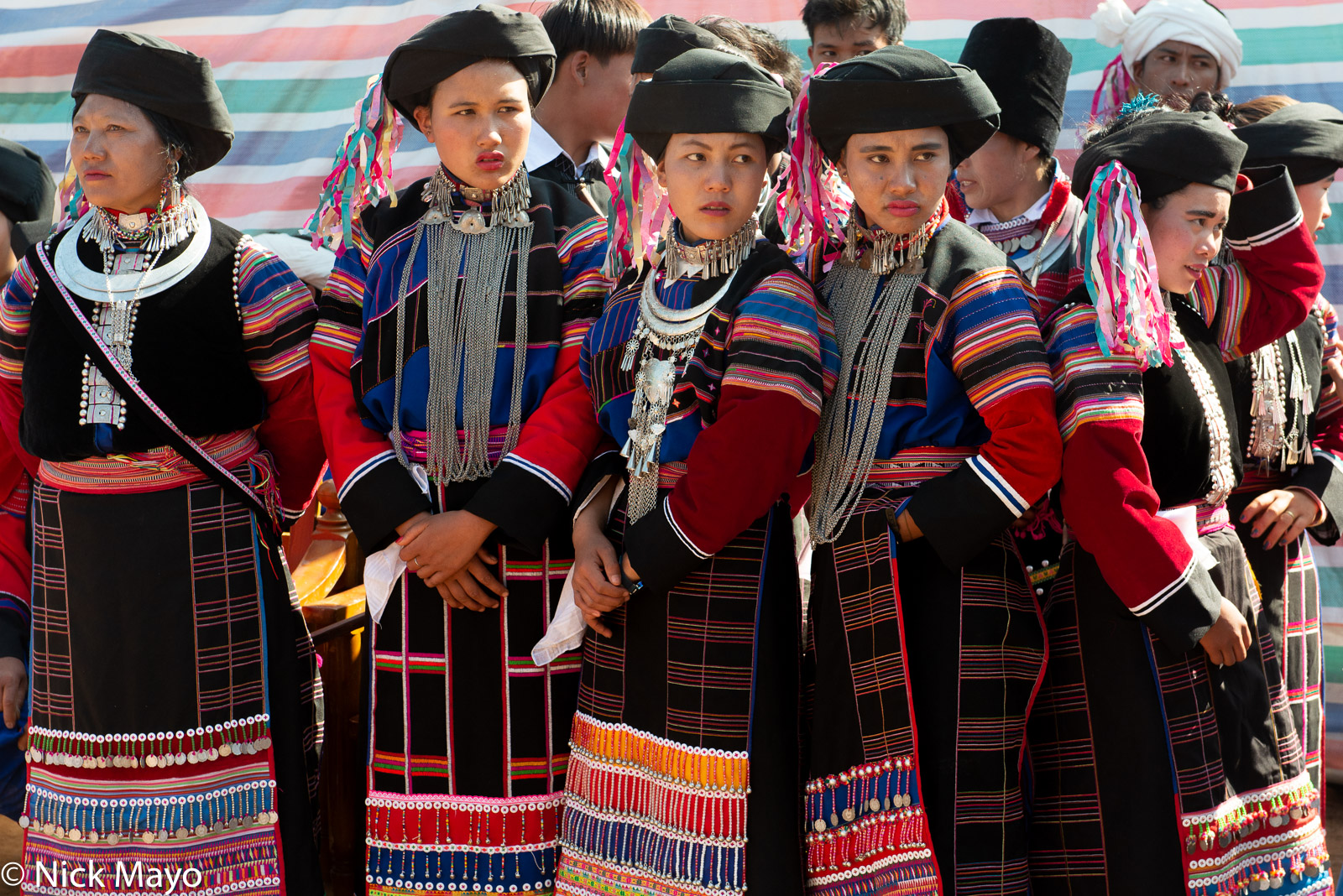 A group visiting from the Namshan area waiting to participate in the dance competition at a Lisu New Year festival in Mogok.