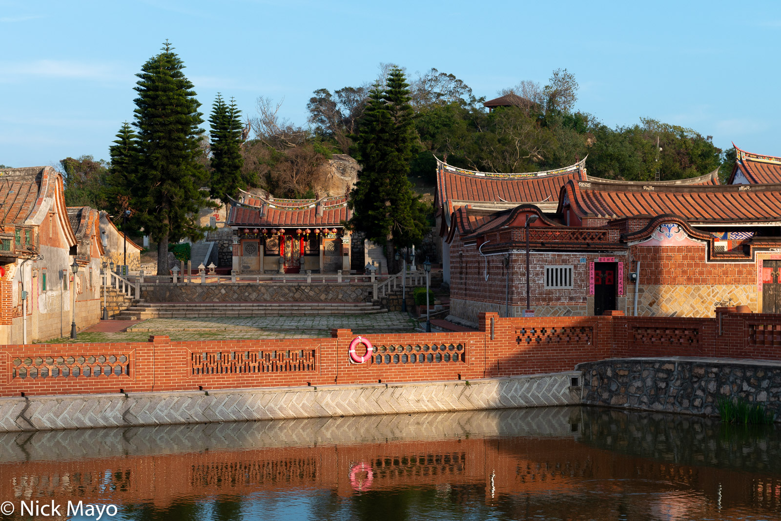 The temple and Minnan style village houses with their distinctive roofs at Zhushan on Kinmen.