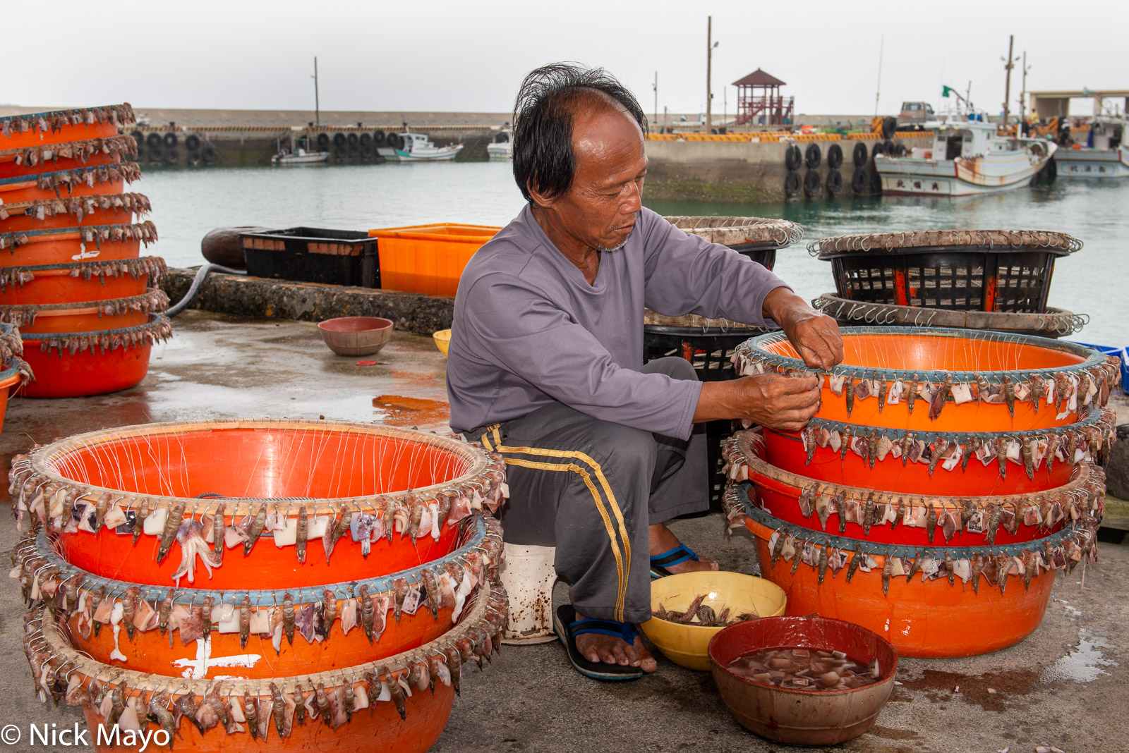 Preparing bait lines at Beiliao fishing harbour.