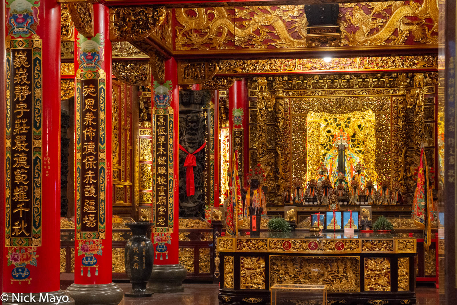 The shrine in the richly decorated Shizhou temple at Nanzhou in Pingtung County.