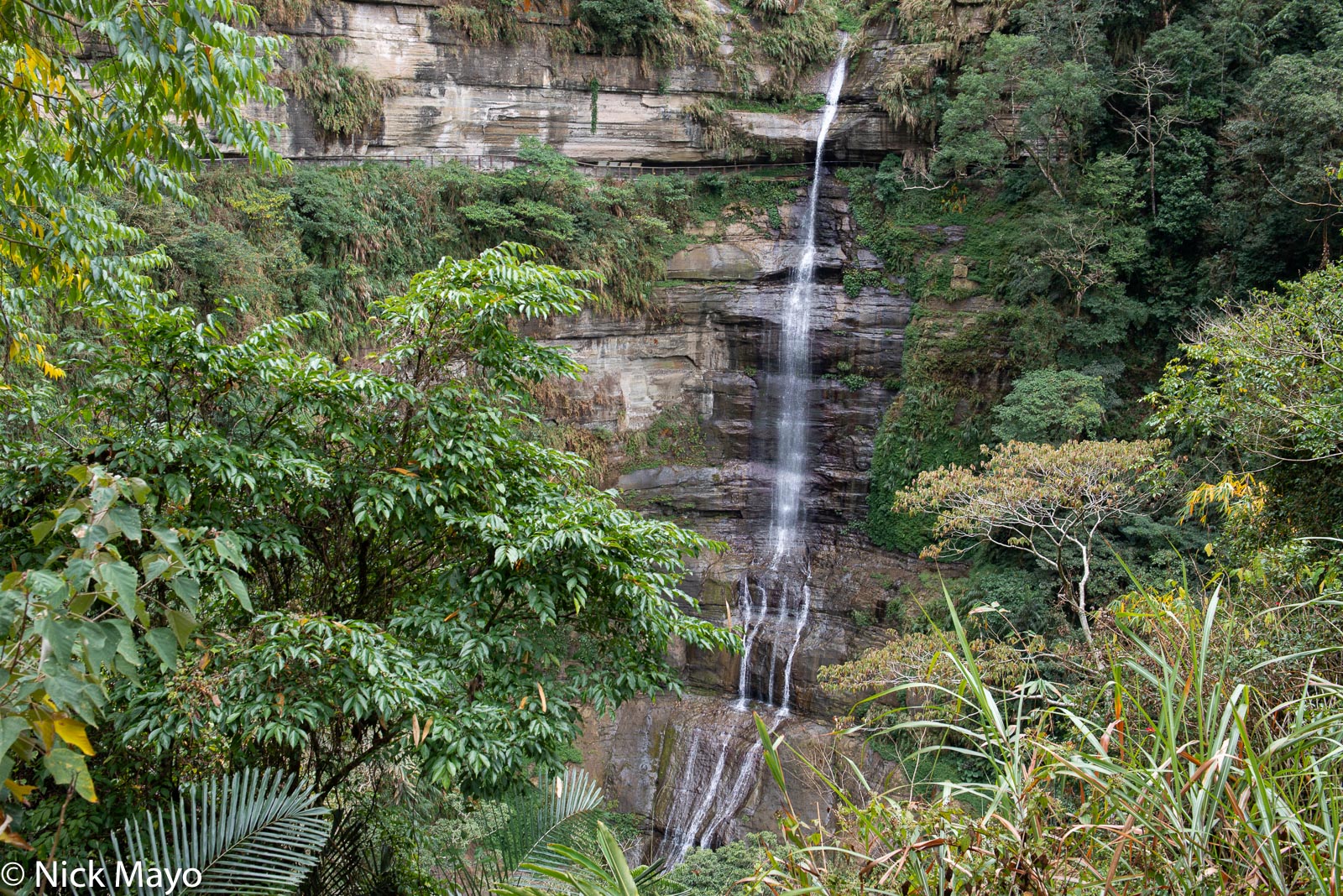 The Langgong waterfall, notable for the walkway passing behind it, at Zhukeng in Chiayi County.