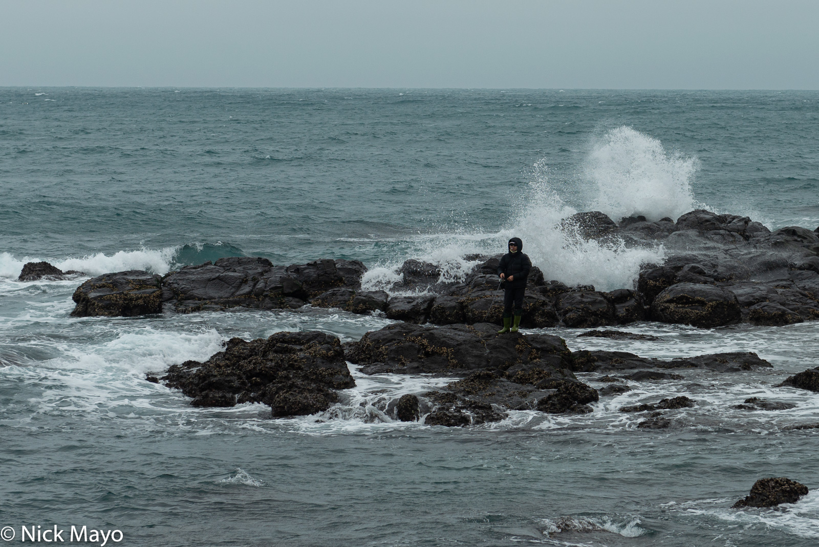 A man fishing at Shuian on Wangan.
