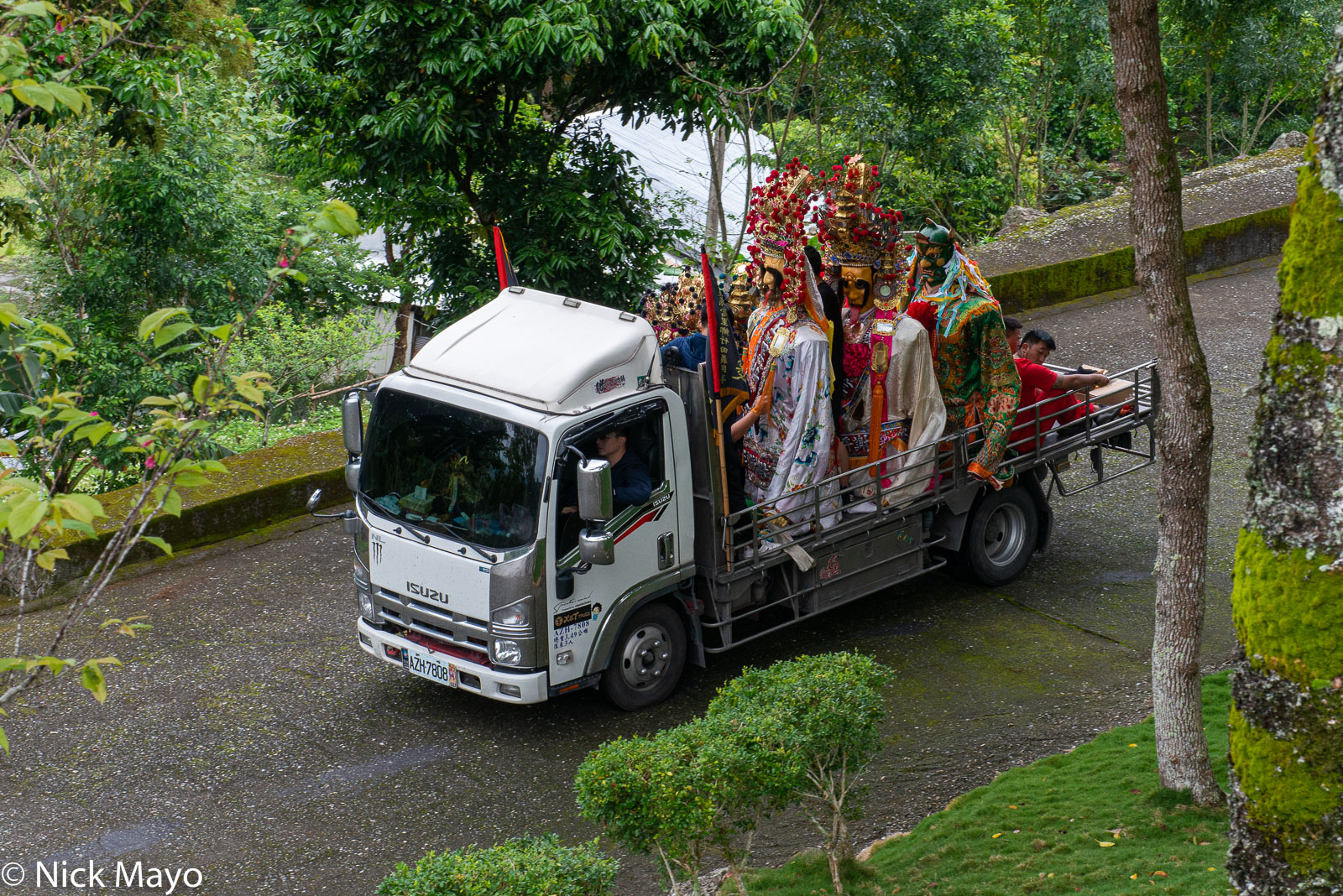 A truck carrying Great God Generals between temples at Dongxing in Hualien County for a festival to celebrate Matsu's birthday...