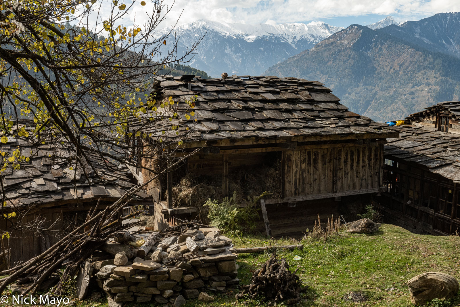 A wooden Kulu house with a slate roof in Hallan-I village.