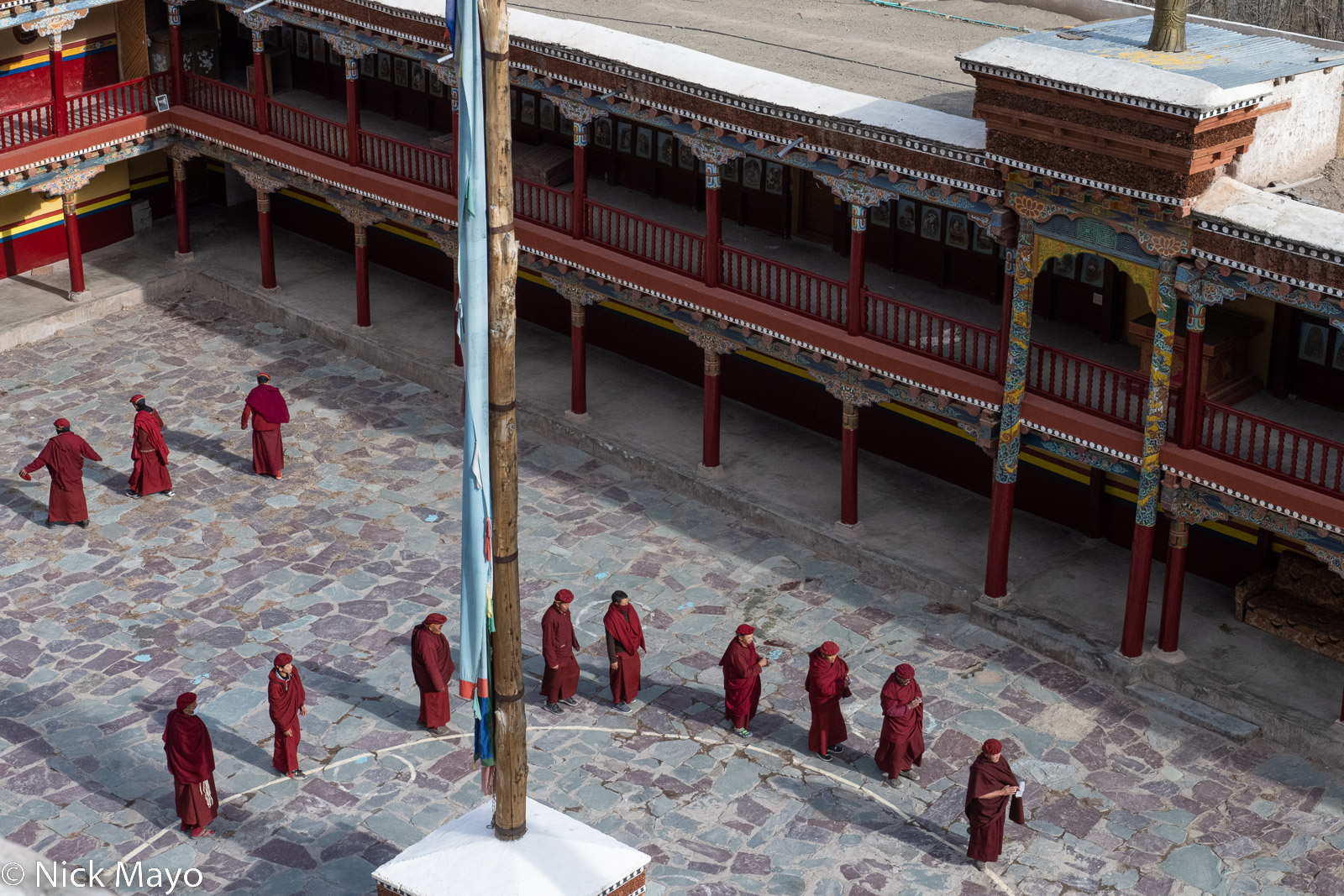 Monks rehearsing dance routines for the upcoming winter festival at Hemis monastery.