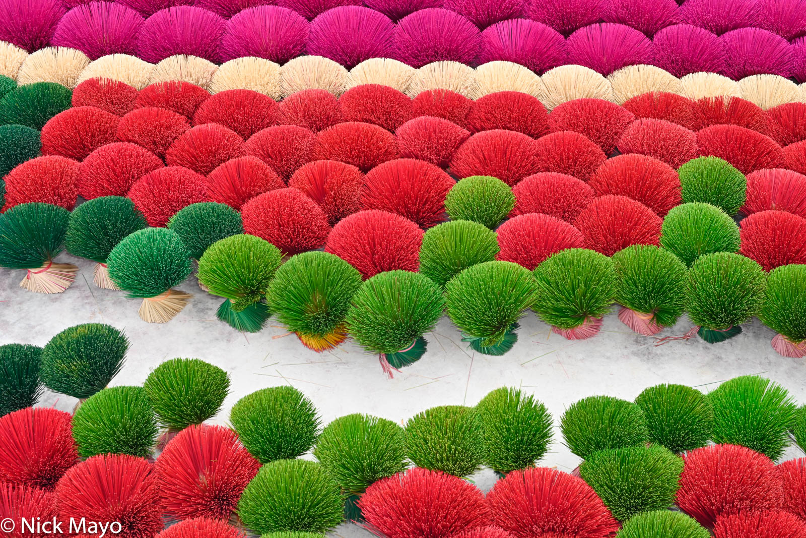 A display of incense sticks of many colours in Quang Phu Cau.