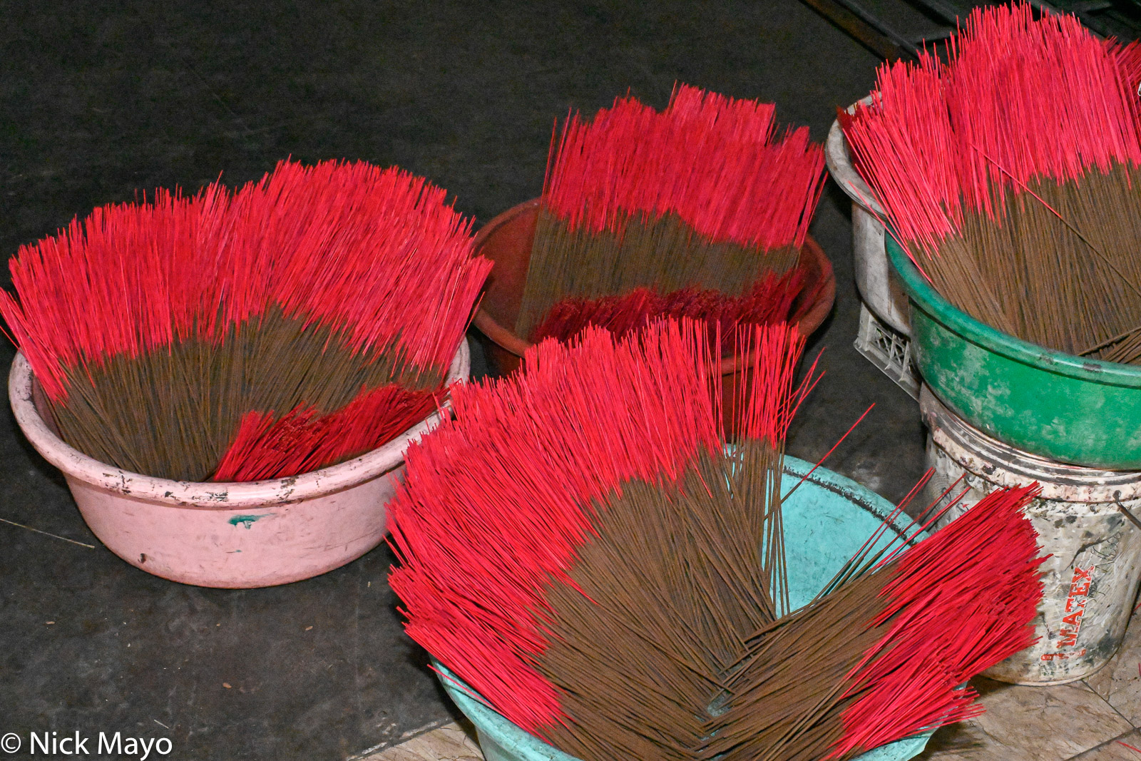 Bowls of incense sticks at Quang Phu Cau.